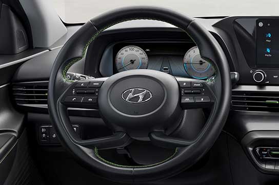 Sporty 4-spoke steering wheel.